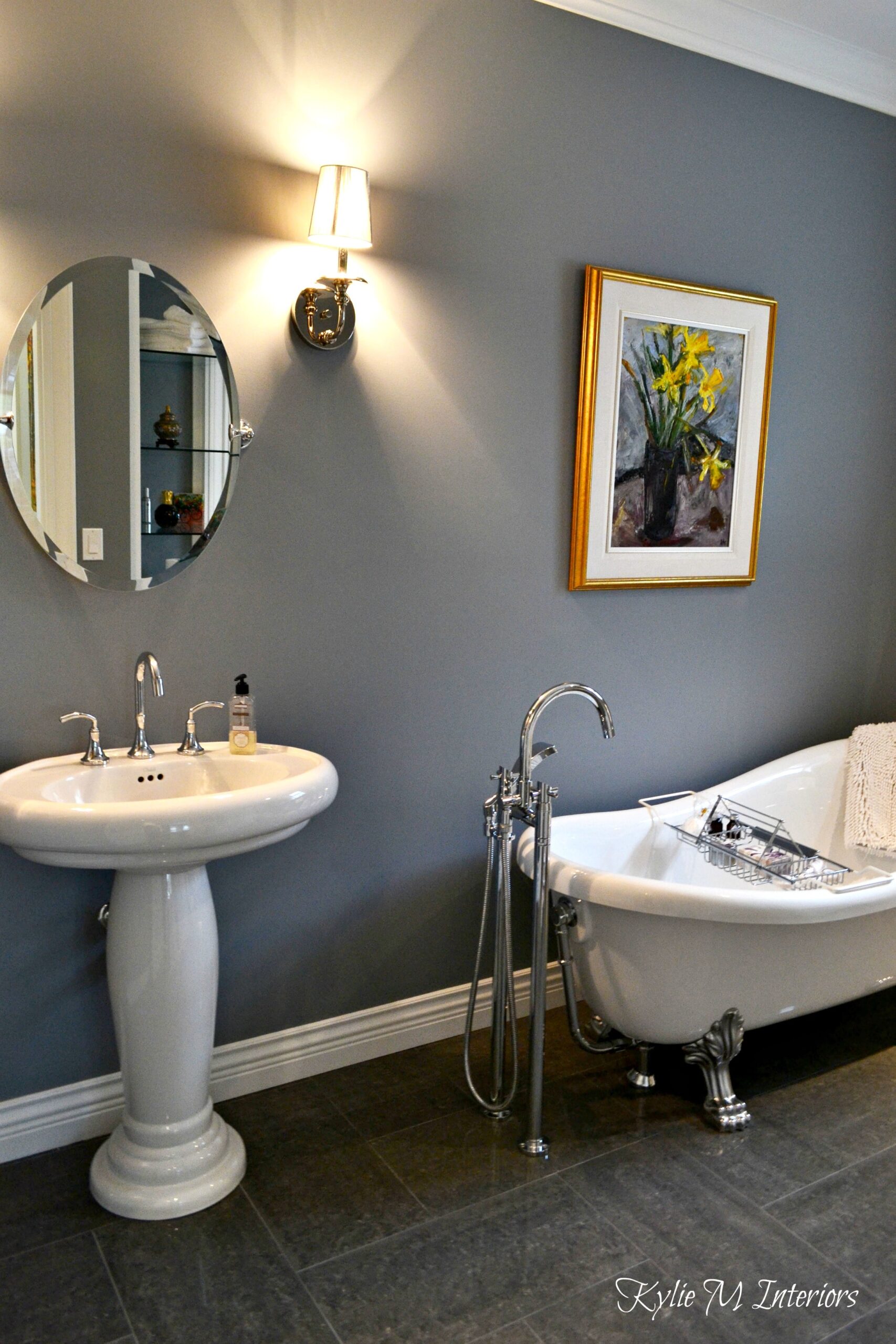 Benjamin Moore Dior Gray in bathroom with pedestal sink and freestanding tub on shiny porcelain tile flooring