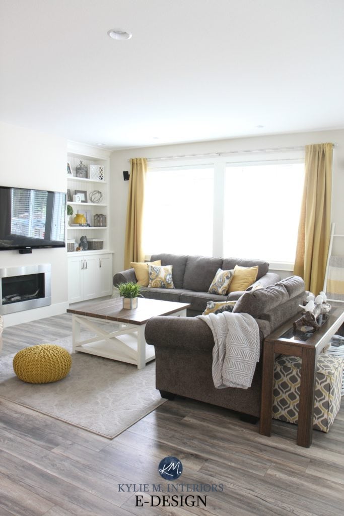 Living room with gold drapes makes a room feel cozier. Comfy style with built-ins Kylie M Interiors Edesign