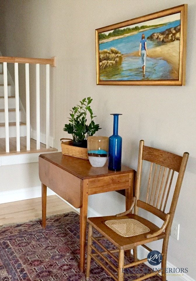 Sherwin Williams Canvas Tan with light maple wood flooring and stairs. Kylie M Interiors Online Color Consulting and e-decor and design