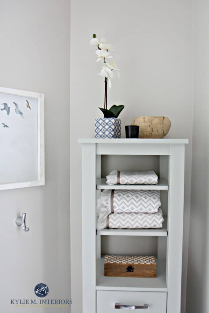 Benjamin Moore Classic Gray is great for home staging and selling with bathroom decor and linen tower. Kylie M Interiors