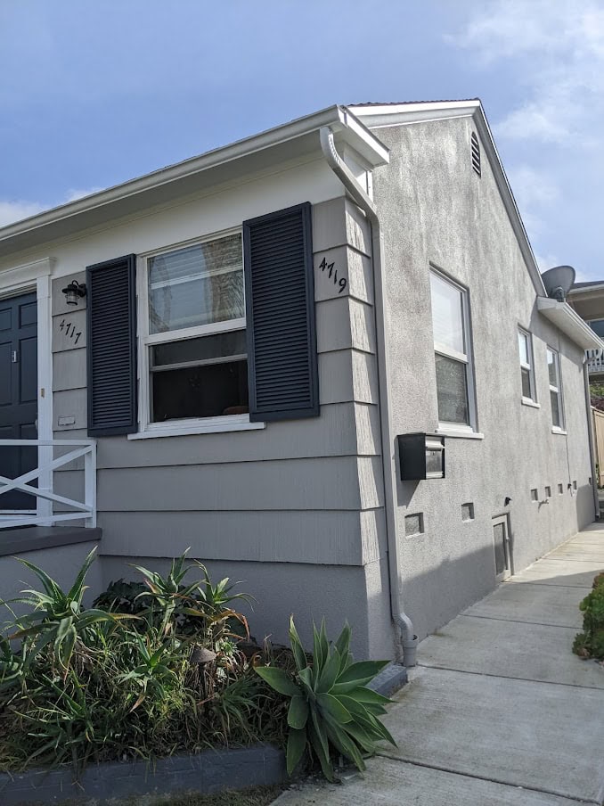 Exterior Sherwin Williams Requisite Gray, east exposure, Sherwin Williams Cyberspace shutters and front door. Kylie M Interiors Edesign, curb appeal ideas