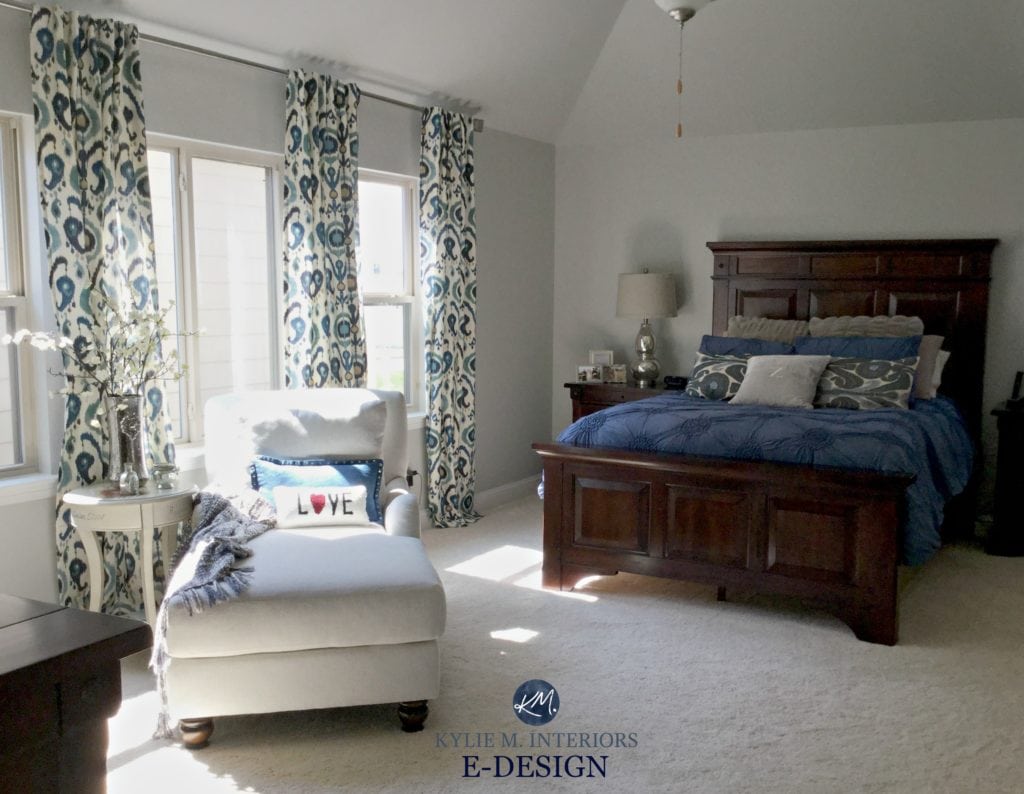 Sherwin Williams Repose Gray, master bedroom with dark cherry wood furniture, navy blue, white and red accents. Kylie M E-design and online color consulting expert