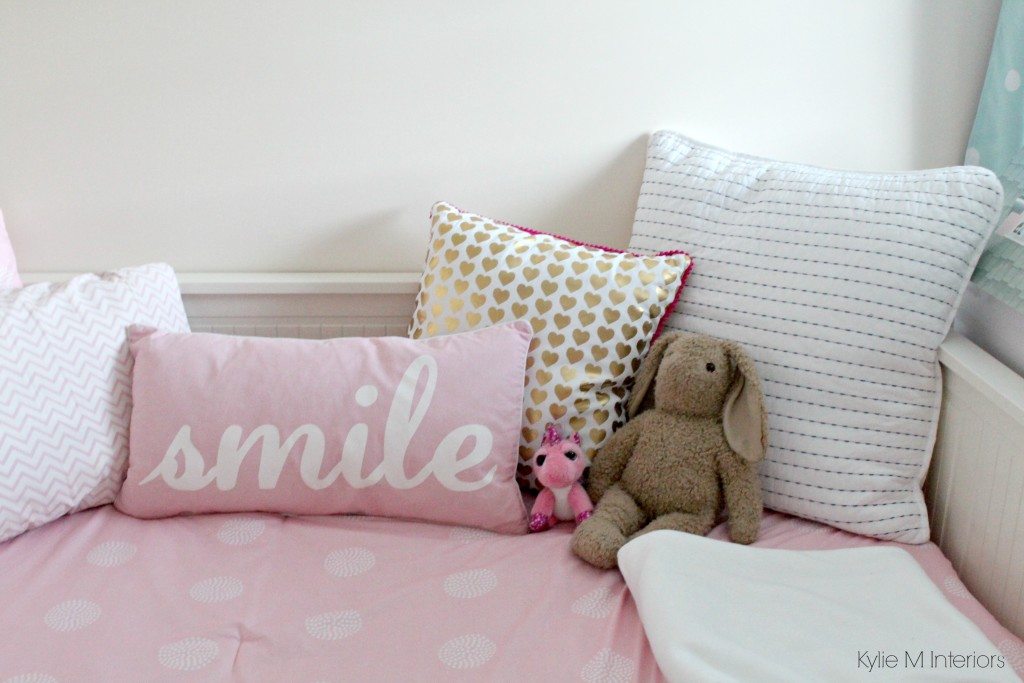 girls bedroom decorating ideas with ikea hemnes bed, raskog cart and kallax cubby bookshelf unit. Pink, blue, brass and yellow