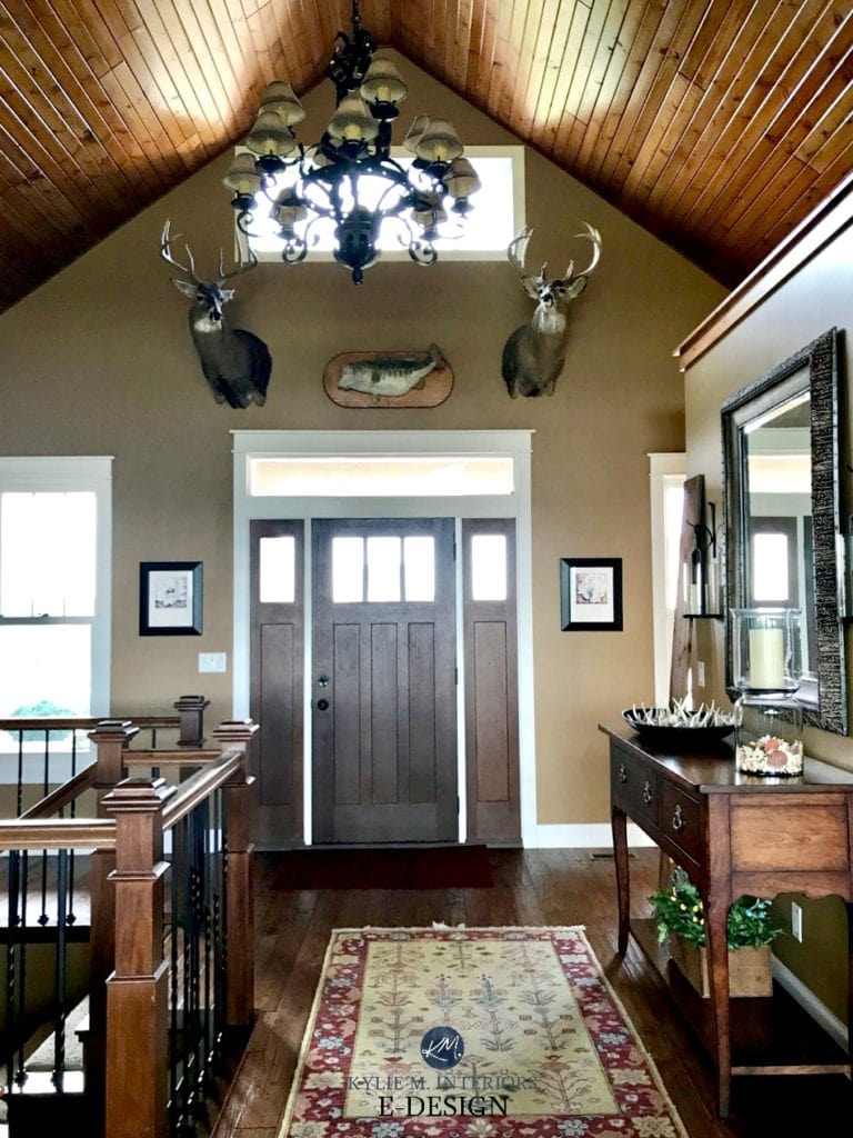Cardboard Shwerin Williams. Best brown paint colour in vaulted entryway with hunting trophies, deer and wood floor. KYlie M E-design