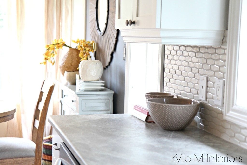 Soapstone Sequoia formica countertops with cloud white cabinets and countertop decor