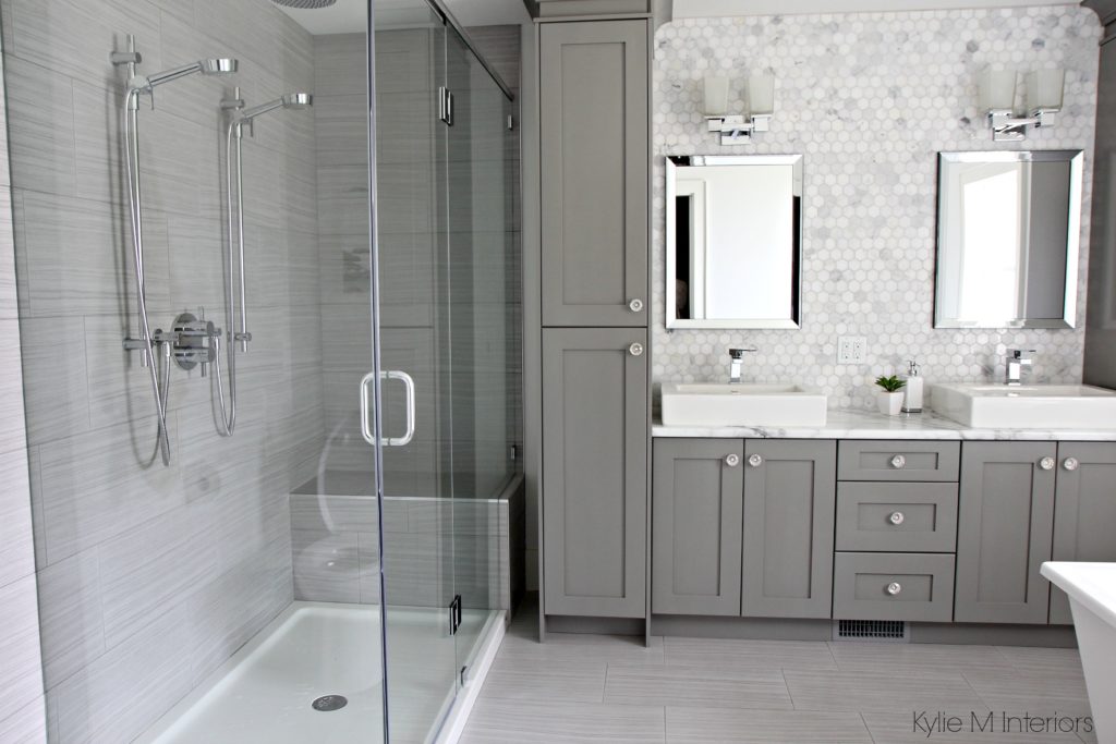Double vanity bathroom with Calacatta marble Formica 180FX, walk in shower and hexagon marble backsplash by Kylie M Interiors Online Color and Decorating Consultant