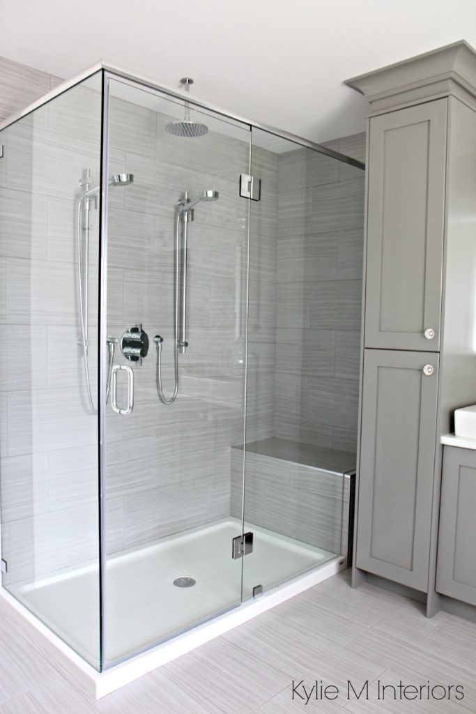 Walk in shower with 2 shower heads, fibreglass base and porcelain surround. Vanity tower painted Benjamin Moore Chelsea Gray. Design by Kylie M Interiors E-Design