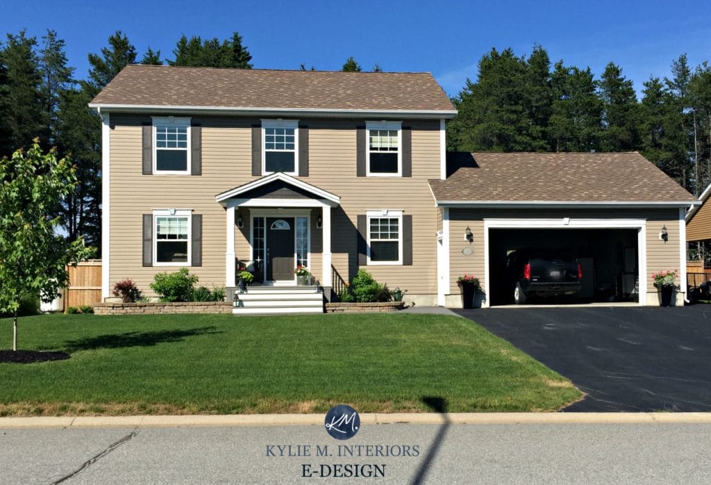 Front door paint colour Sherwin Williams Night Owl with beige vinyl siding and white trim. Kylie M E-design