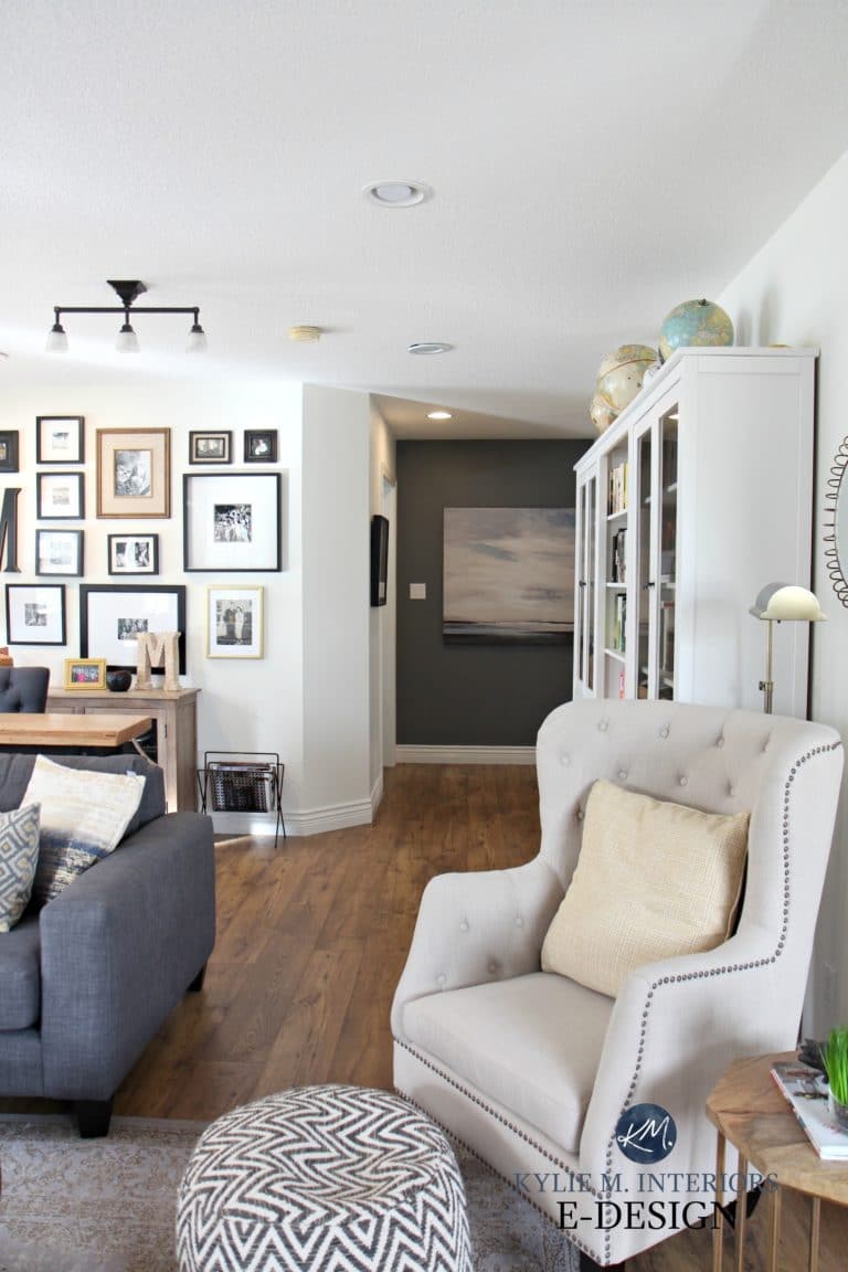 Feature wall in hallway with Benjamin Moore Steel Wool, Sherwin Creamy, gallery wall. Kylie M E-design