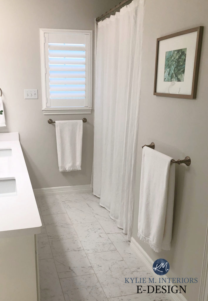 Sherwin Williams Egret White, bathroom, marble look floor tile, white vanity, taupe warm gray paint colour. Kylie M Interiors, online paint color consultant, diy
