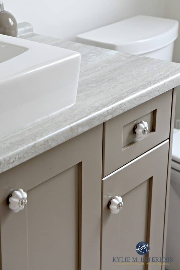 Benjamin Moore Kingsport Gray painted vanity with Travertine 180fx Silver countertop and raised vessel sink by Kylie M Interiors