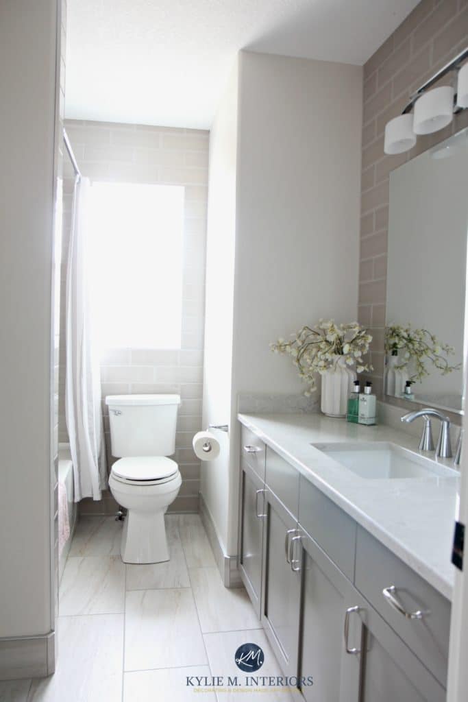 Greige and gray bathroom update with Bianco Drift quartz, Metropolis vanity, Classic Gray and subway tile walls in shower