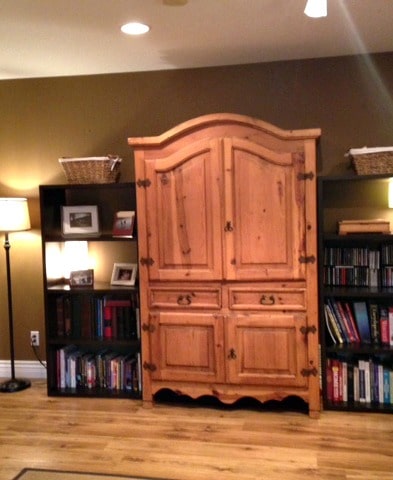 Southerwestern style pine wood armoire before being painted diy