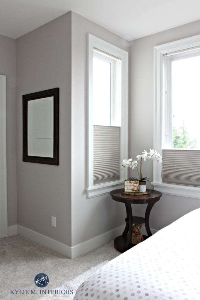 Benjamin Moore Abalone in a guest bedroom wtih cellular blinds, greige carpet and white trim. Kylie M Interiors Color Consulting, E-decor