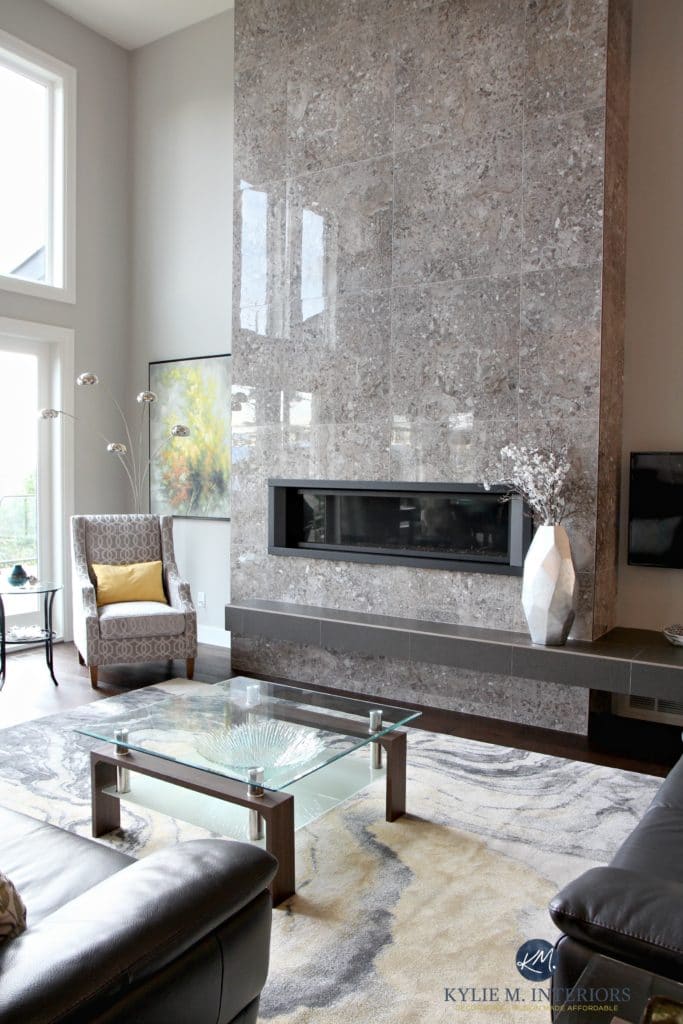 Contemporary design living room with tall tile fireplace with modern linear gas insert and floating hearth. Sherwin Williams Repose Gray. Kylie M Interiors E-decor and Design Online