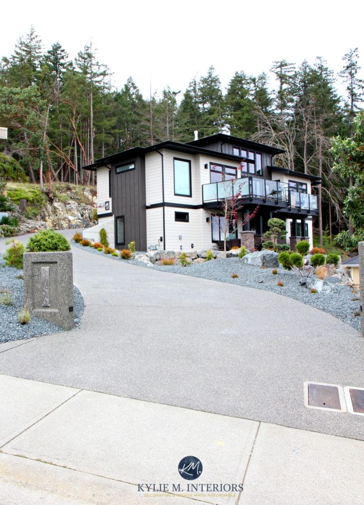 Contemporary exterior with hardiboard in Cobblestone, black windows, trim and Black Fox siding. Kylie M Interiors Colour Consultant