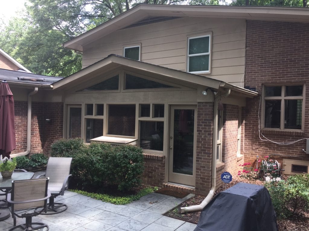 Exterior brick and siding back yard BEFORE painting
