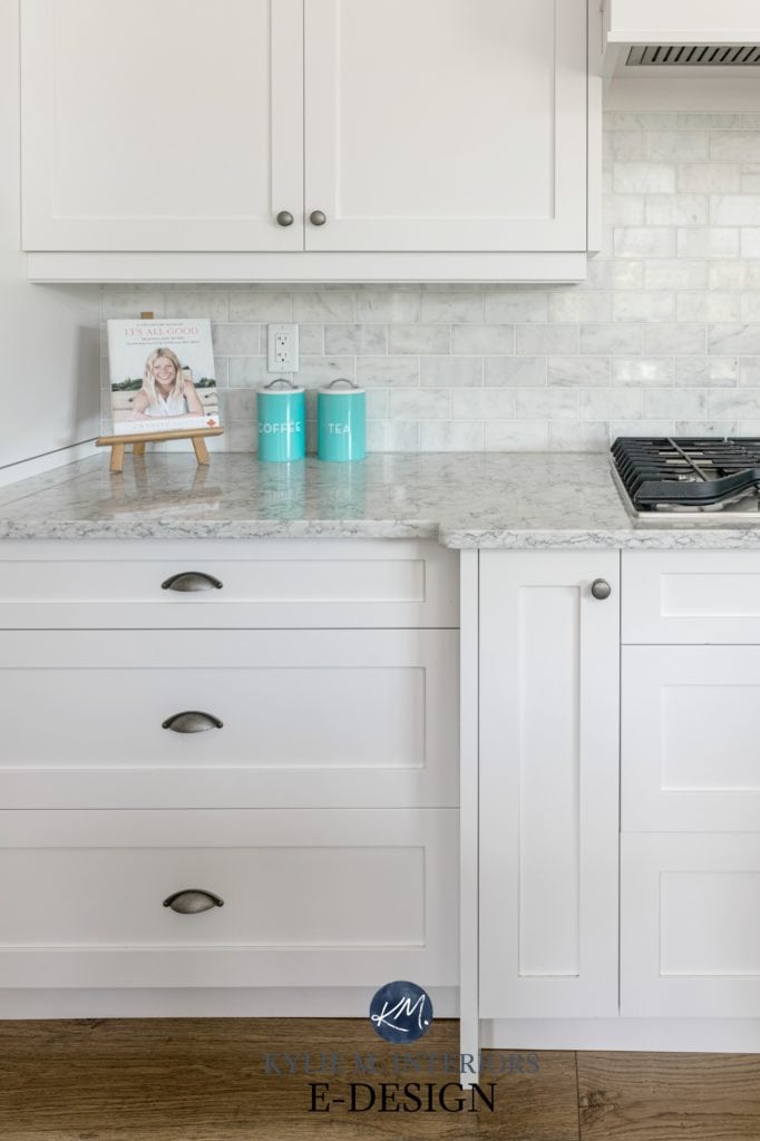 White kitchen cabinets, Sherwin Williams, marble subway tile backsplash, white, gray veined quartz countertop LG, stainless steel appliances. Angled range hood Kylie M Interiors Edesign (3)