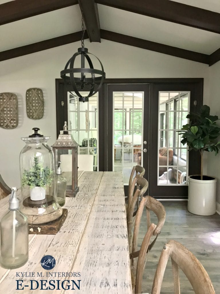 Sherwin Williams Agreeable Gray paint colour via Kylie M e-design Farmhouse style dining room with wood table, dark wood trim