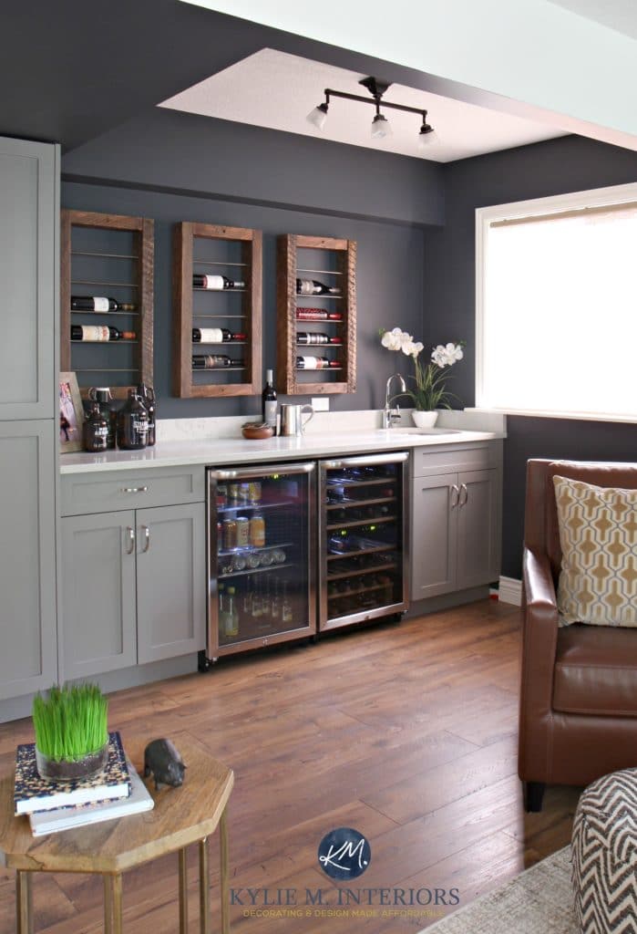 Sherwin Williams Cyberspace in home bar with reclaimed wood wine display with beer fridge and Cambria Bianco Drift countertops. Kylie M INteriors E-design