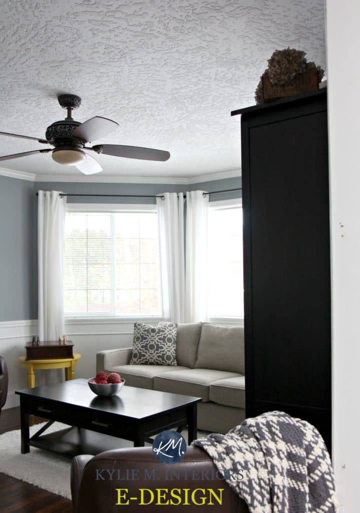 Sherwin Williams Network Gray in living room with white trim, beige couch. Kylie M INteriors E-design and online color consulting
