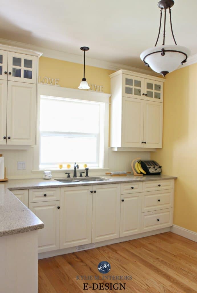 Benjamin Moore Suntan Yellow in kitchen with quartz, painted cream oak cabinets similar to White Rock. Kylie M E-design