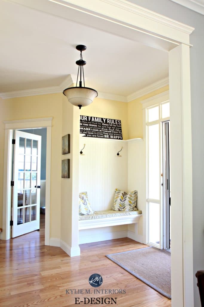 Best yellow paint colour. Benjamin Moore Buttermilk. Oak flooring. country style foyer, entryway with built in bench and hooks. Kylie M E-design, online colour consultant