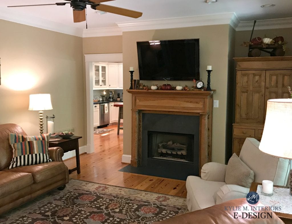 Benjamin Moore Lenox Tan, north facing living room. Pine flooring, furniture and fireplace mantel, Tv and fall decor. Kylie M E-design and online paint colour consulting