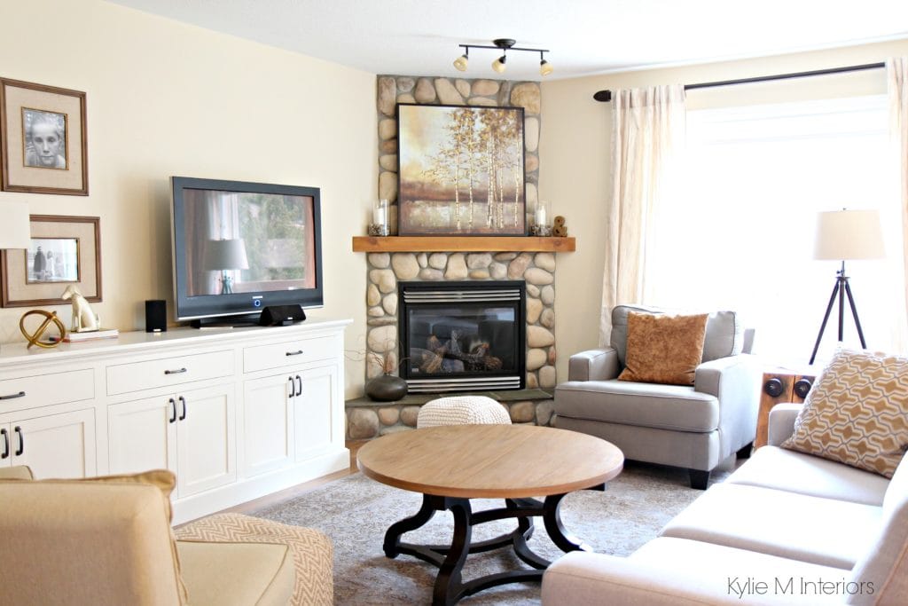 South west facing living room with stone corner fireplace, furniture, home decor and custom tv stand