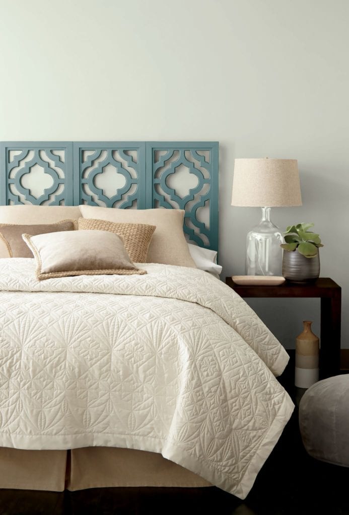 Behr In the MOment, a blue green gray paint colour on a painted bedroom headboard. Kylie M Interiors blog. Photo via Behr.
