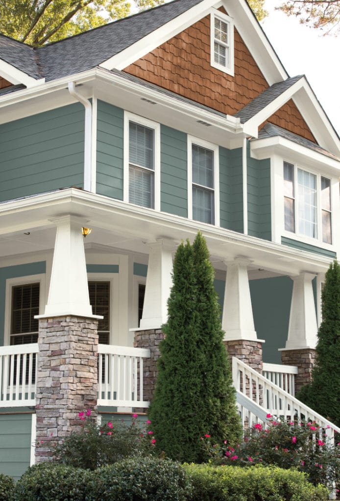 Behr in the Moment on an exterior of 2 storey home with stone and trim. Photo via Behr. INfo Kylie M Paint colour blog