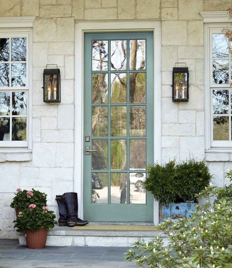 Behr in the Moment painted on a front door with white stonework. Curb Appeal. Photo via Behr. Kylie M interiors colour blog.