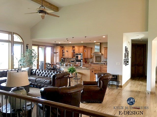 Sherwin Williams Accessible Beige in open concept layout. Vaulted 2 storey ceilings in mountain retreat with leather and light wood flooring. Kylie M INteriors E-design