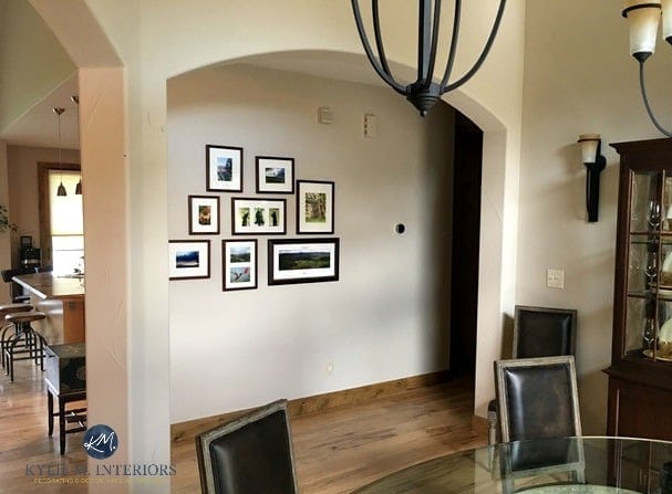Sherwin Williams Accessible Beige with wood floor and trim. Gallery wall down hallway. Kylie M E-design and Online Colour consulting expert