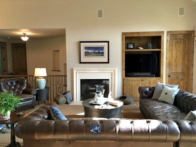 Sherwin Williams Accessible beige with leather sectional, fireplace and built-in wood tv STand. Kylie M Interiors E-design, online colour expert
