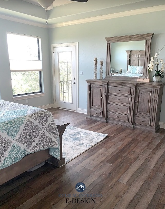 Sherwin Williams Silver Strand in a north east exposure bedroom. Wood floor and furniture. Kylie M Interiors Edesign, online paint color consultant and advice blog