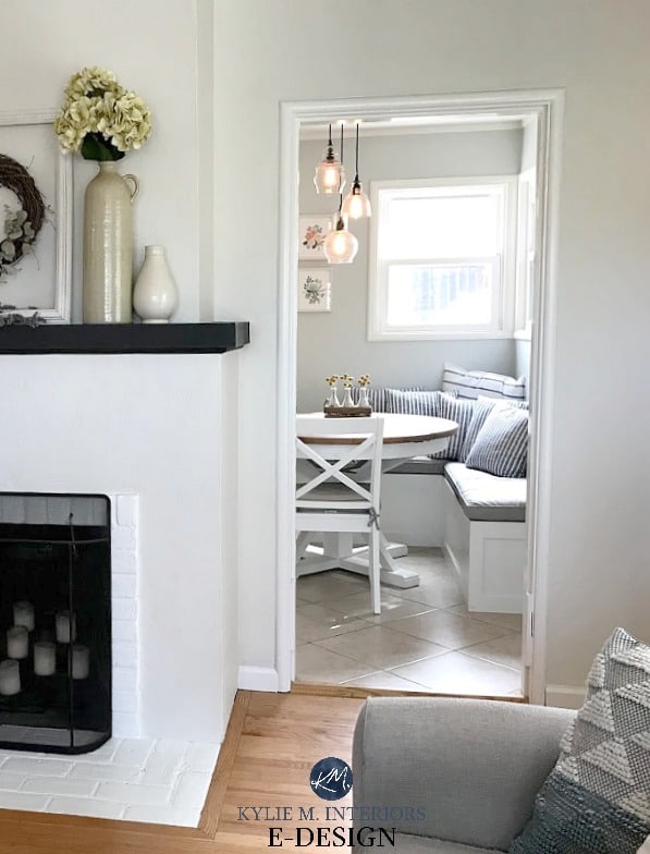 Benjamin Moore Ballet White, stucco and brick fireplace with oak or fir wood flooring. Gray Cashmere kitchen. Kylie M INteriors Edesign, online paint color advice blog and consulting