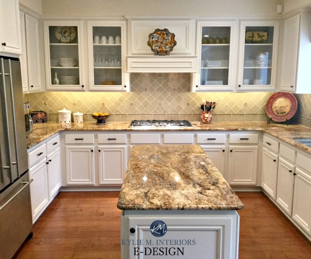 Maple wood kitchen cabinets painted Benjamin Moore White Down. Kylie M E-design, online virtual paint consulting. Granite countertop, backsplash, glass cabinets, maple wood flooring