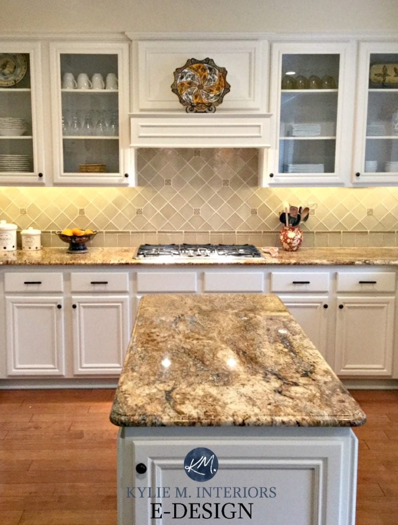 Maple wood kitchen cabinets painted Benjamin Moore White Down. Kylie M E-design, online virtual paint consulting. Granite countertop, backsplash, glass cabinets, wood flooring