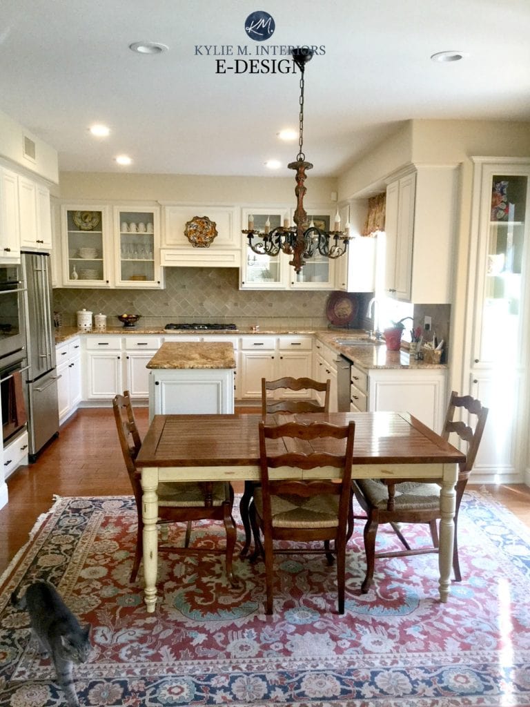 Wood maple kitchen cabinets painted Benjamin Moore White Down. Kylie M E-design, online virtual paint consulting. Granite countertop, backsplash, glass cabinets, wood flooring