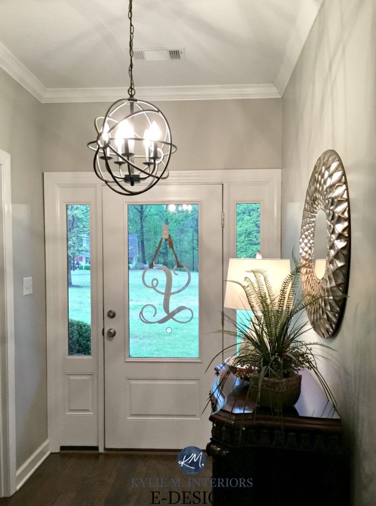Sherwin Williams Anew Gray entryway, Greige, mushroom paint colour, white front door, chandelier and mirror. Kylie M INteriors Edesign, virtual online paint colour consulting. Client before photo