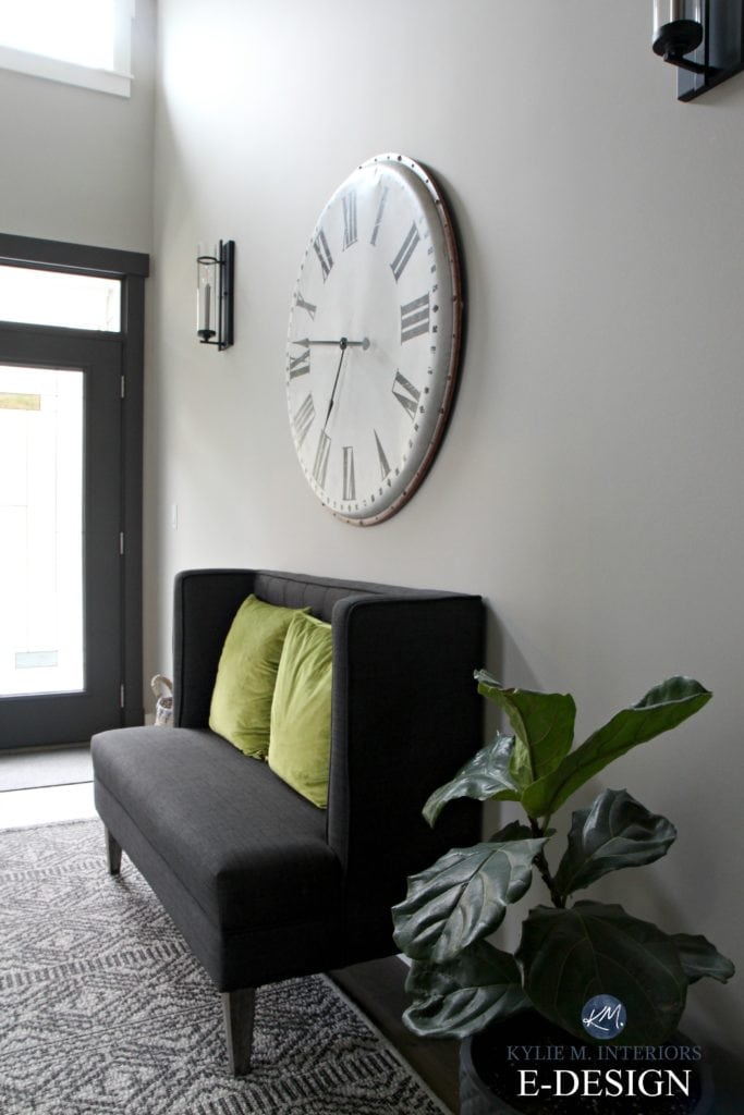 Entryway in Sherwin Williams Collonade Gray with oversized large clock, charcoal bench seat and front door painted Urbane Bronze. Kylie M INteriors Edesign, online paint color expert - Copy