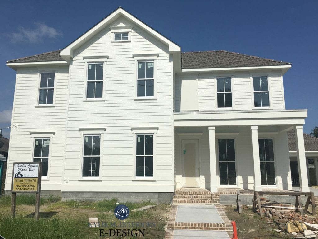 Exterior painted Benjamin Moore White Dove, brick steps and front porch, Weatherwood roof. Kylie M INteriors Edesign. Client photo