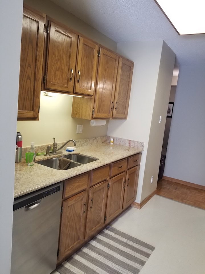 Small oak wood kitchen cabinets before being painted. Budget friendly ideas.