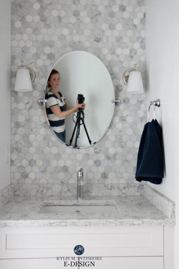 Hexagon marble tile on wall behind vanity, quartz countertop, High Reflective White cabinets. Kylie M INteriors Edesign, online paint color consultant