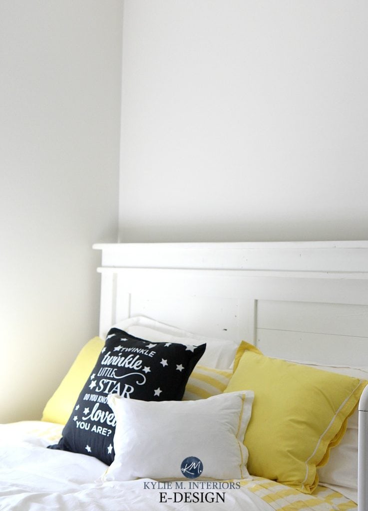 Benjamin Moore Classic Gray with white bedding and yellow and black accents. Warm gray paint colour. Kylie M Interiors Edesign, online paint colour consulting