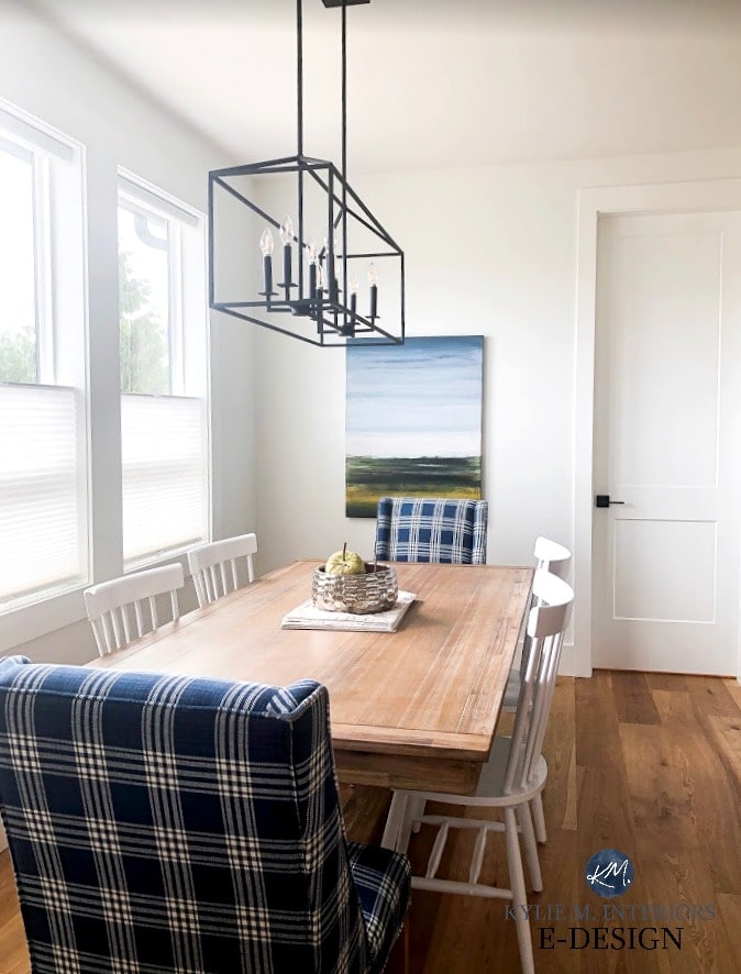 Farmhouse dining room table, Pier 1 chairs. Pure White walls, south facing room. White spindle back chair style from Wayfair. Kylie M Interiors Edesign, online paint colour advice blog