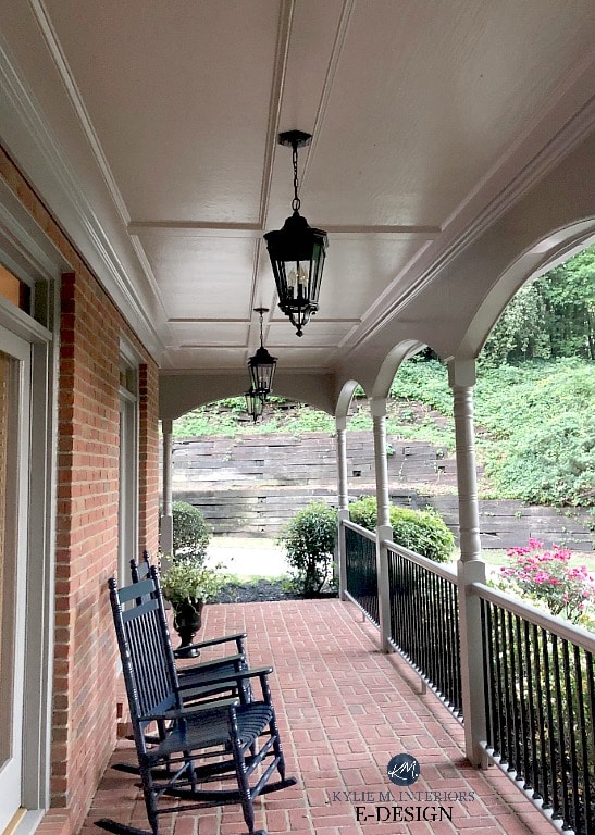 Front porch on red orange brick exterior with Sherwin Williams Mega Greige ceiling. Kylie M Interiors Edesign, online paint color consulting