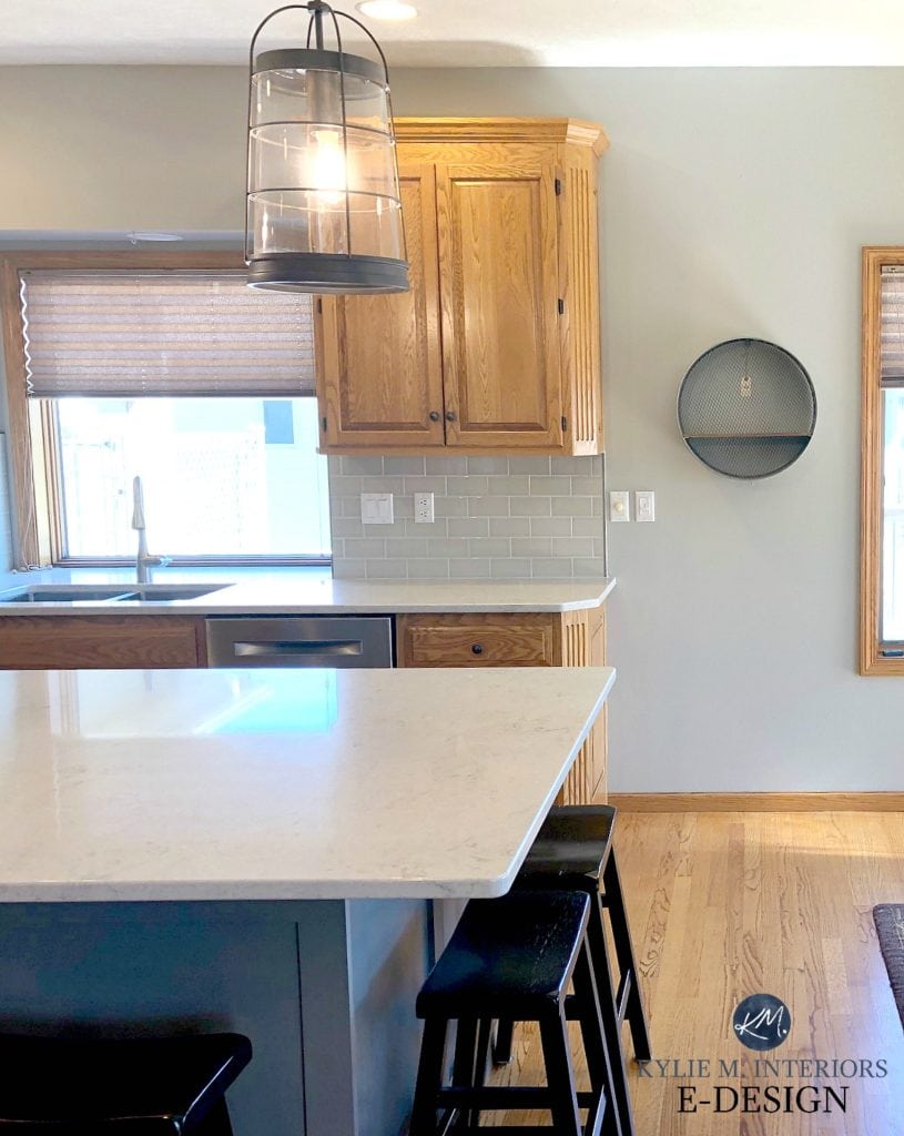 How to update oak kitchen cabinets and floor. Greige subway tile, quartz countertop, Sherwin Williams Mindful Gray paint color. Kylie M Interiors Edesign, online paint color consulting