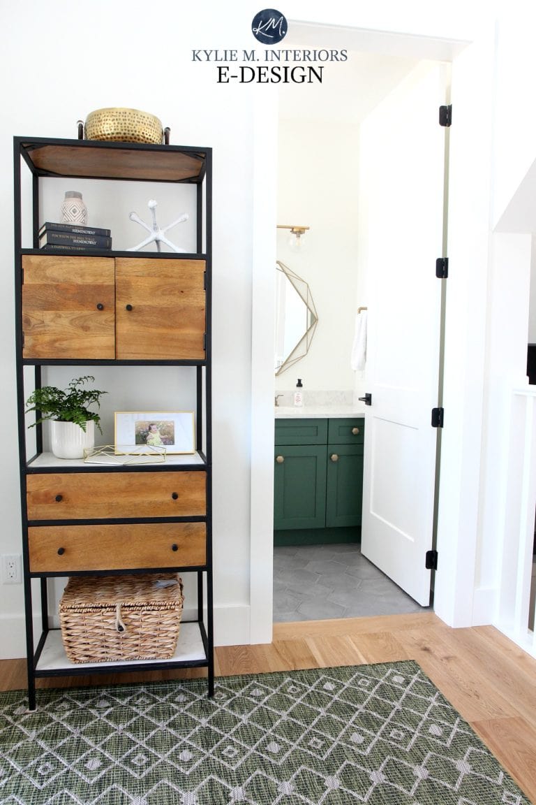 Kylie M Interiors Edesign, powder room, small bathroom with gray hexagon tile floor and green painted vanity with gold accents. Sherwin Williams Pure White. Online paint colour advice and blog